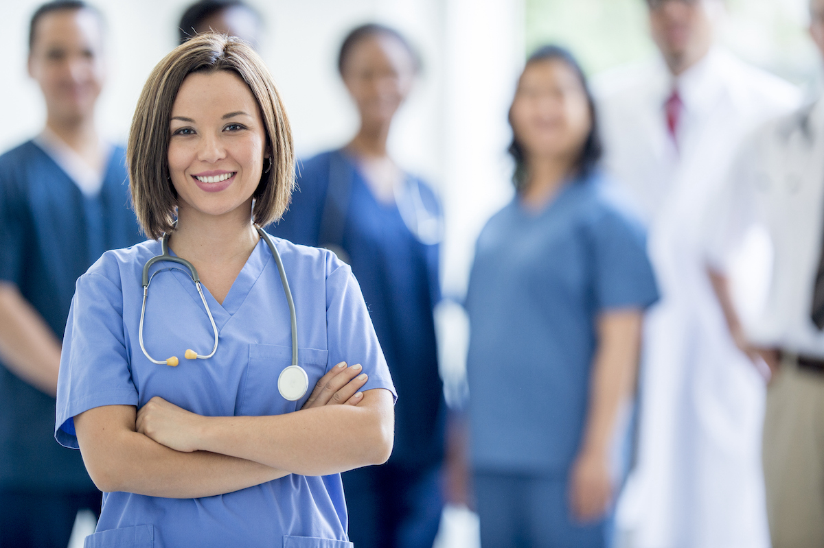 smiling young nurse in hospital setting